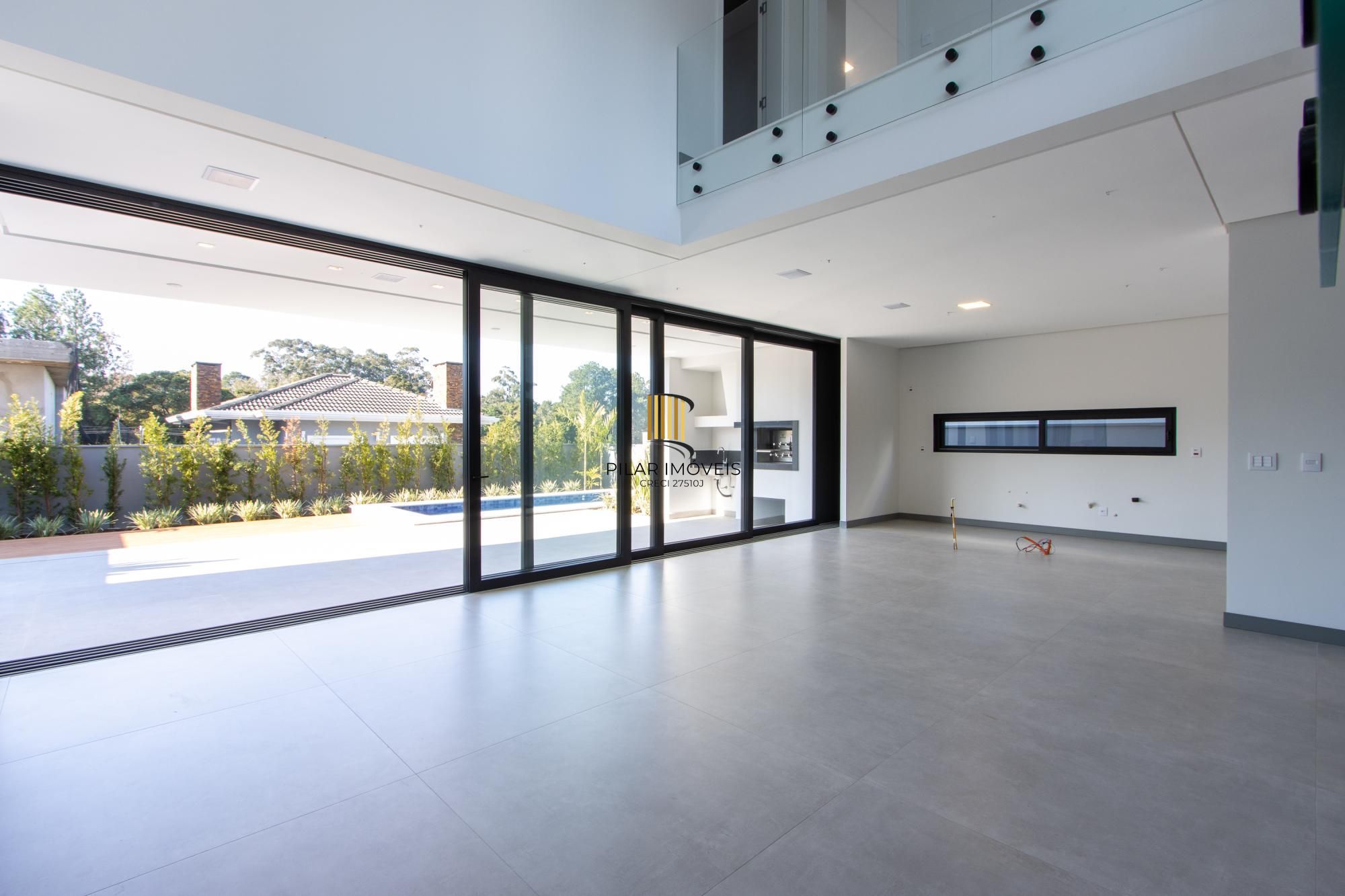 Casa de Condomínio 4 dormitórios no bairro Vila Nova