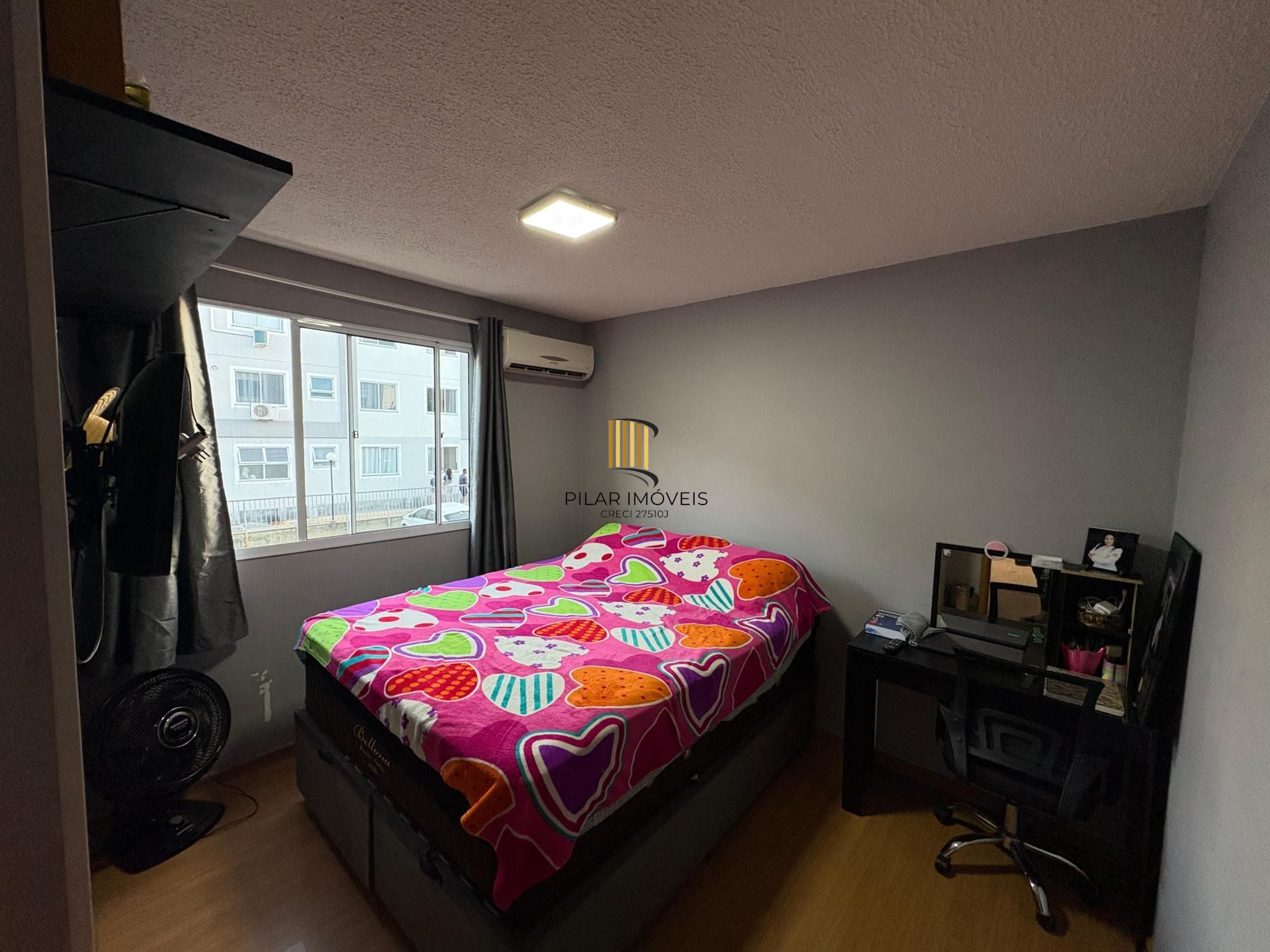 Apartamento em Viamão 2 dormitórios, sala de estar e jantar integradas à cozinha, banheiro social e vaga de garagem privativa.