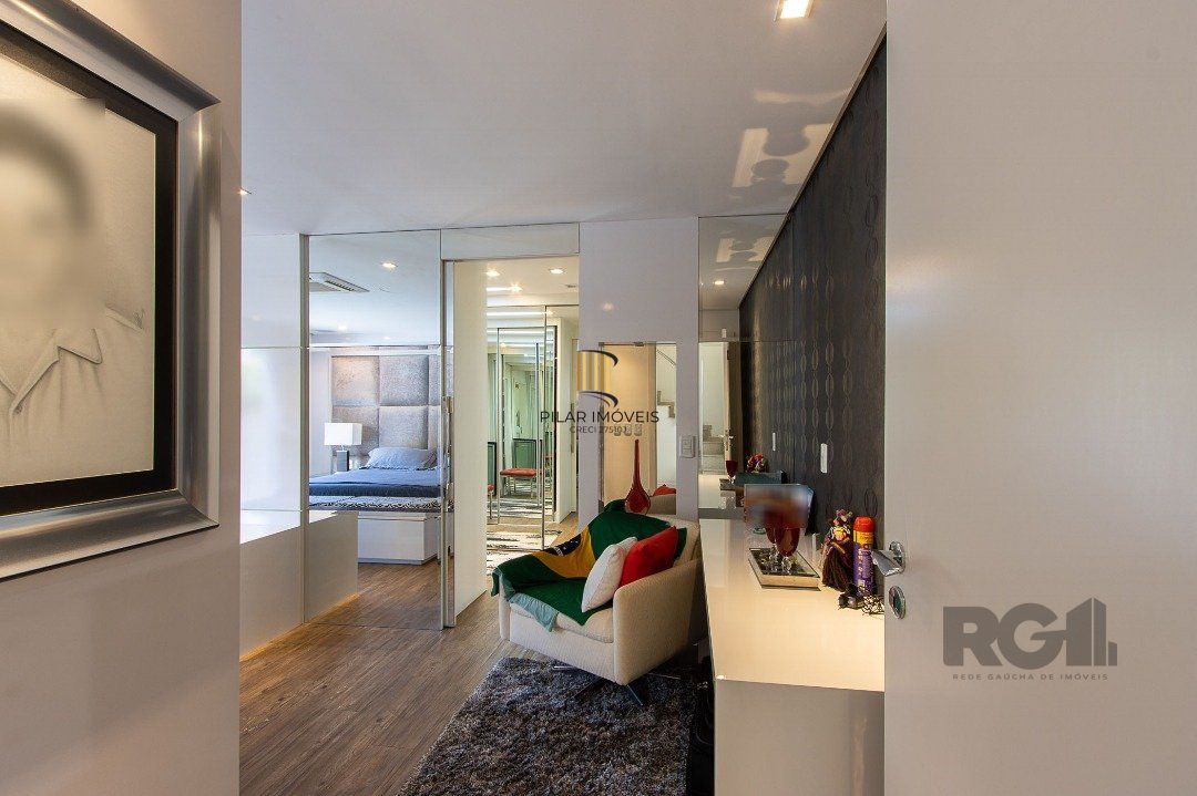 Casa no Condomínio Las Rocas, vista para o Guaíba, com 5 suítes