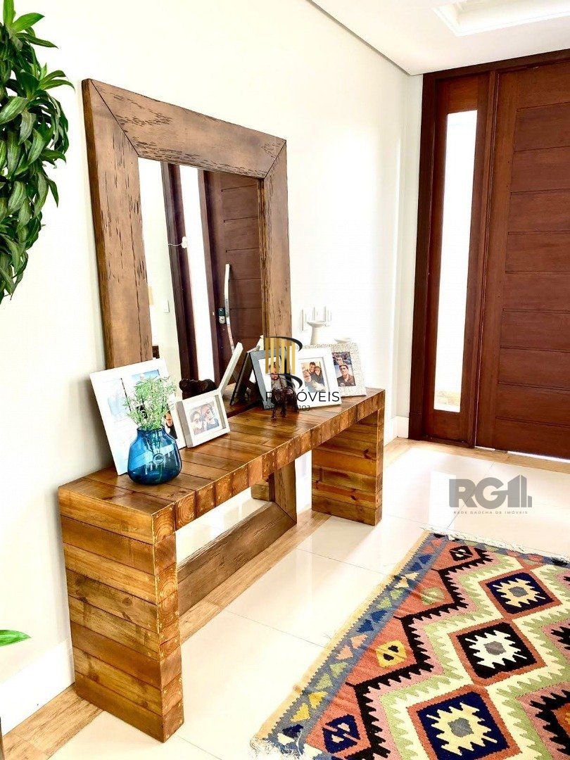 Casa de Condomínio 4 dormitórios no bairro Atlântida