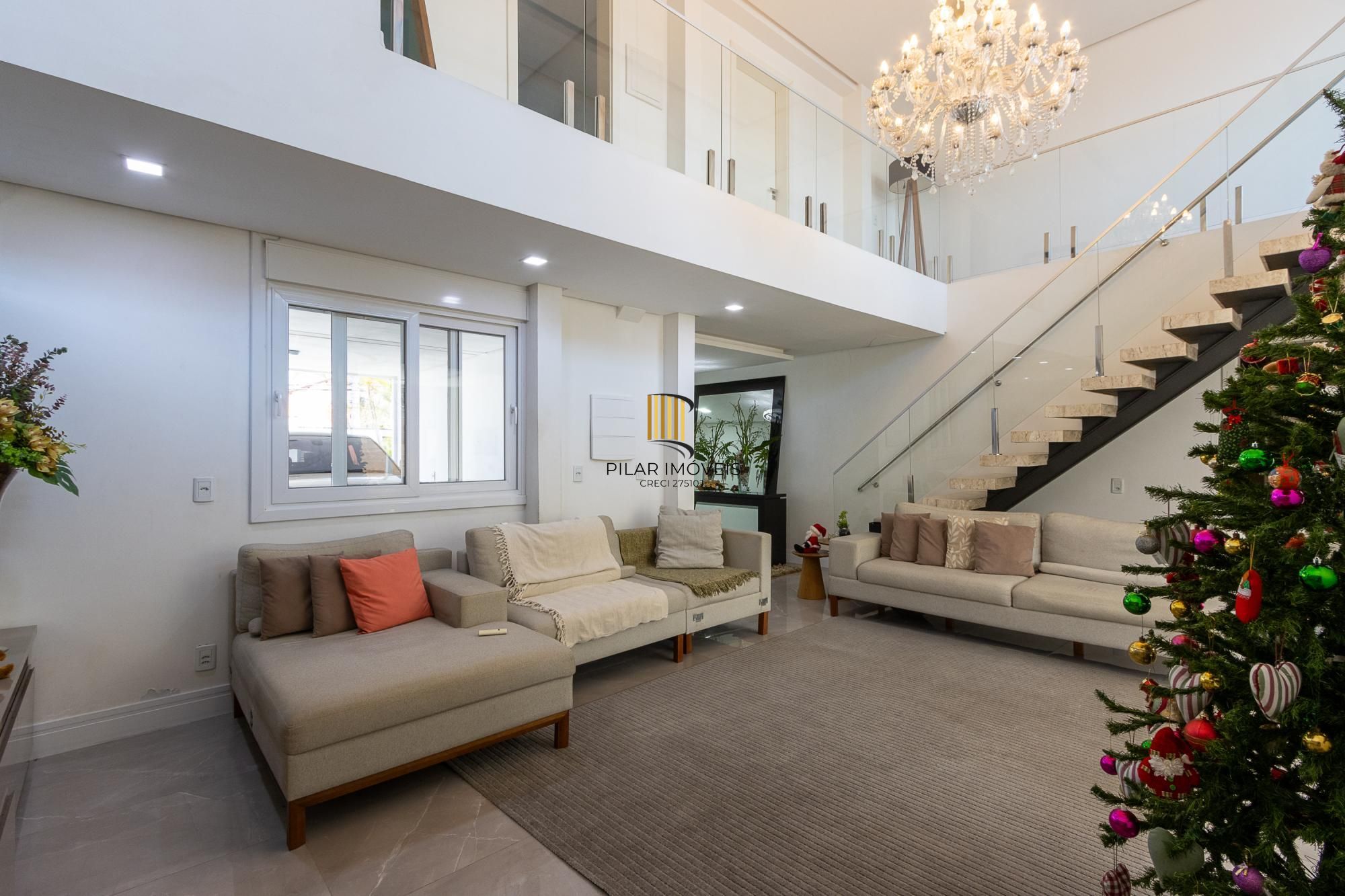 Excelente casa de 3 dormitórios, 3 suítes e 2 vagas no bairro Cavalhada.