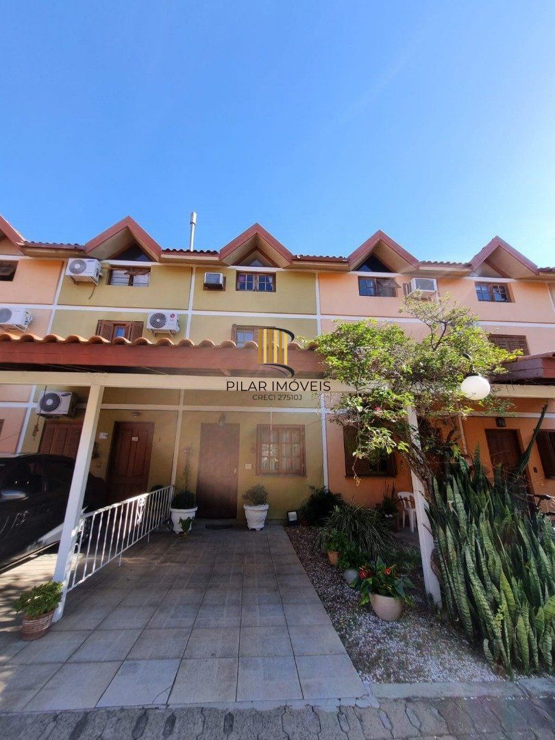 Casa de Condomínio 3 dormitórios no bairro Camaquã