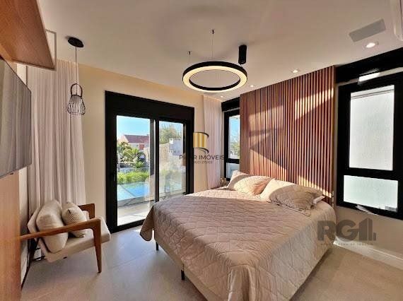 Casa 5 dormitórios no bairro Atlântida