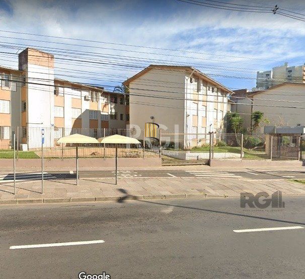 Apartamento de 2 dormitórios, living, cozinha, área de serviço e banheiro social.
