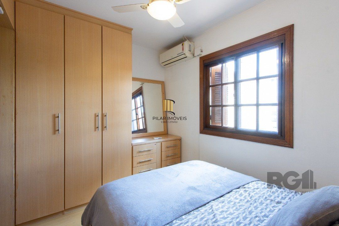 Casa de Condomínio 3 dormitórios no bairro Camaquã