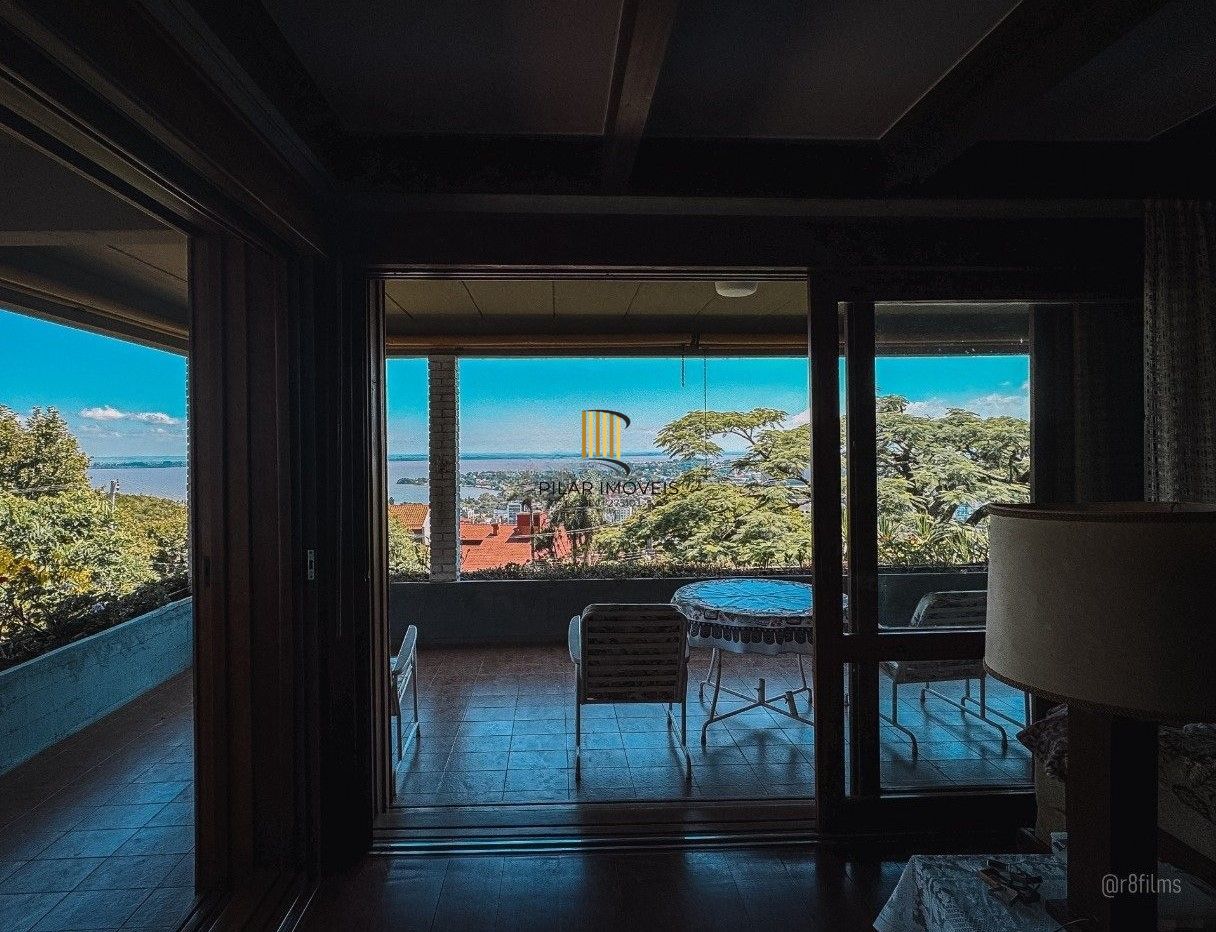 Casa bairro Sétimo Céu, 463m² privativos, vista privilegiada do Rio Guaíba em terreno de 1.423m².
