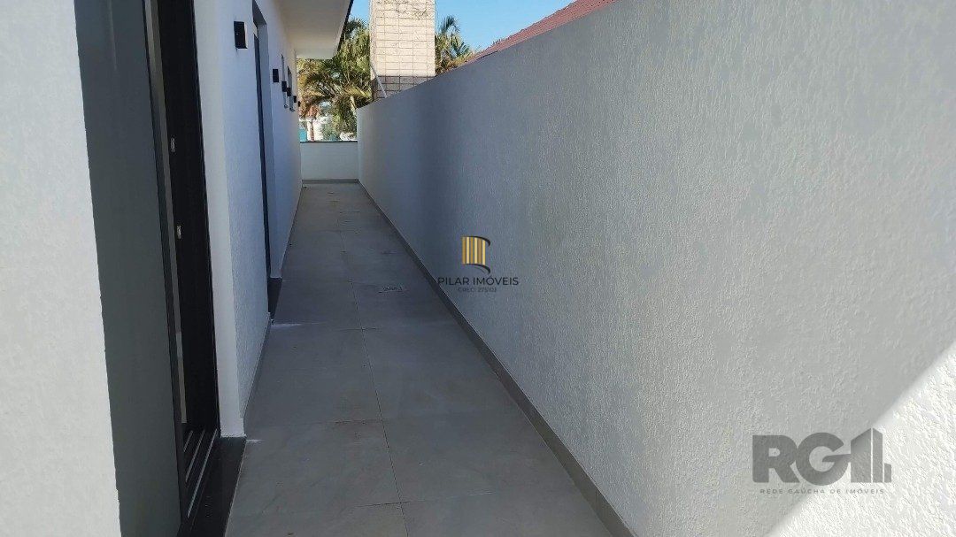 Casa 5 dormitórios no bairro Atlântida