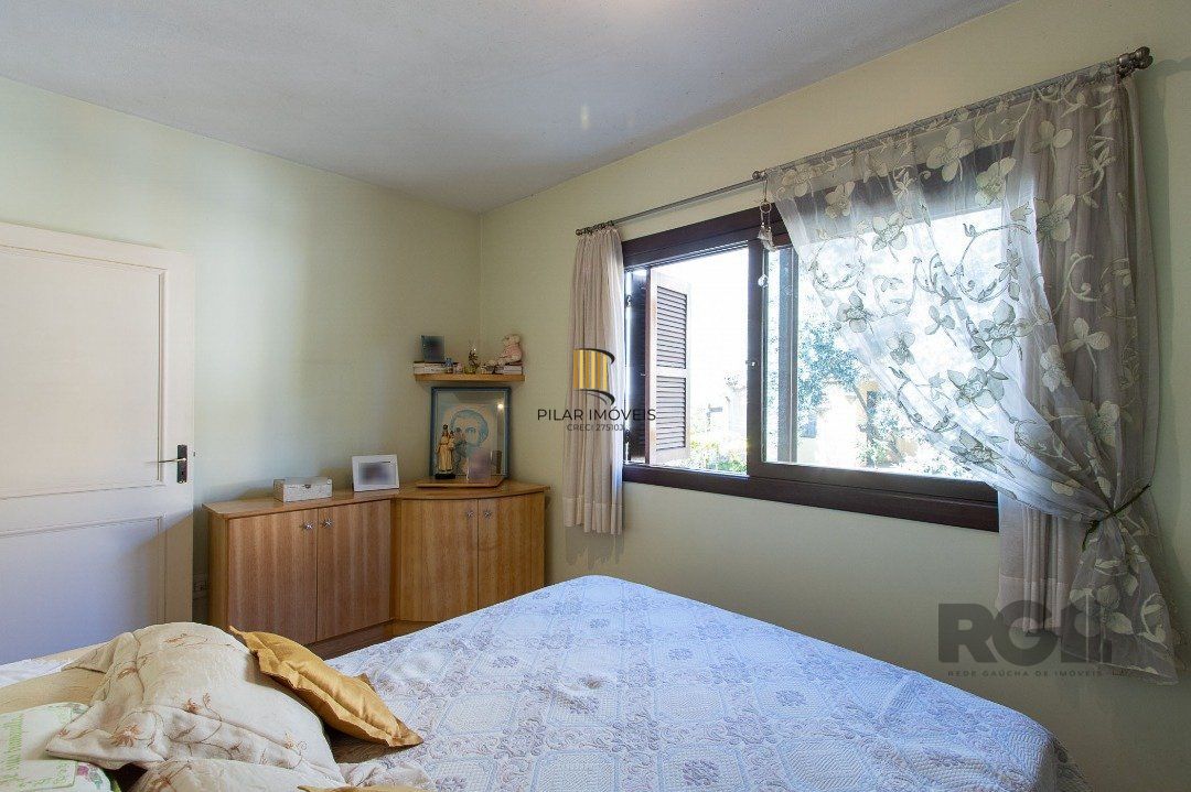 Casa tipo sobrado, com 3 dormitórios em Canoas