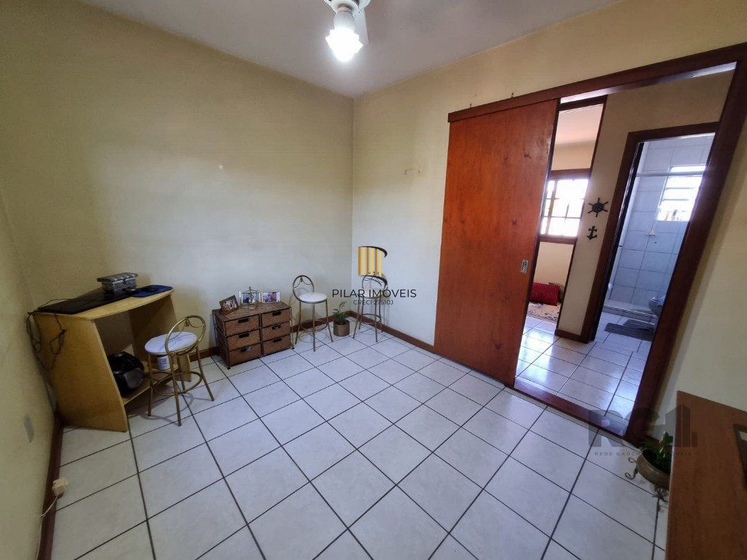 Casa de Condomínio 3 dormitórios no bairro Camaquã