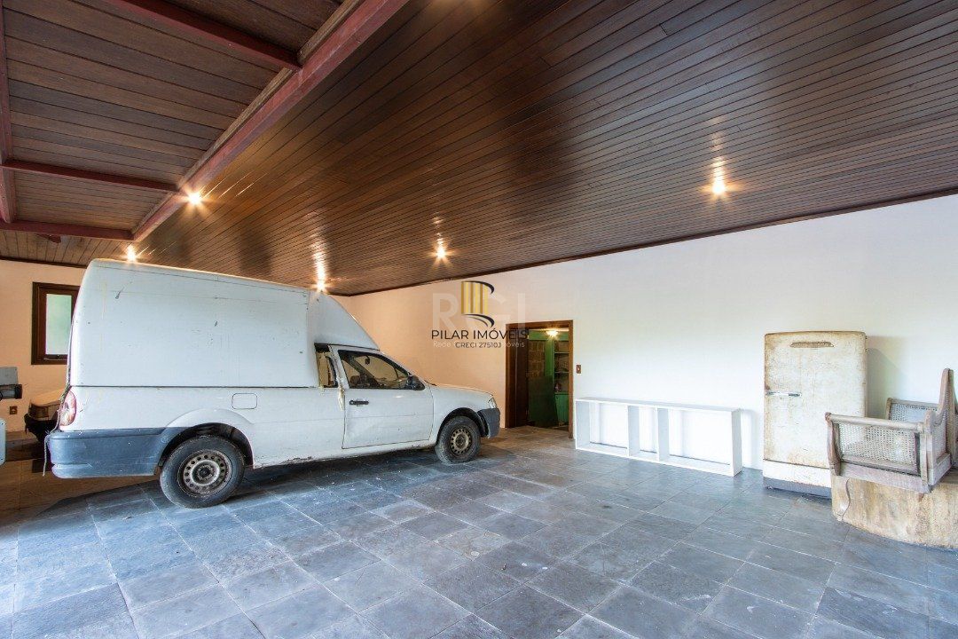 Casa de Condomínio 8 dormitórios no bairro Cavalhada