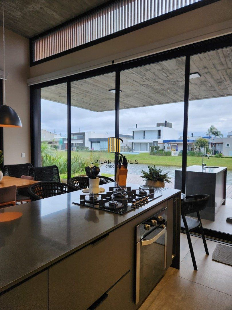 Casa de Condomínio 4 dormitórios no bairro Capão Ilhas Resort