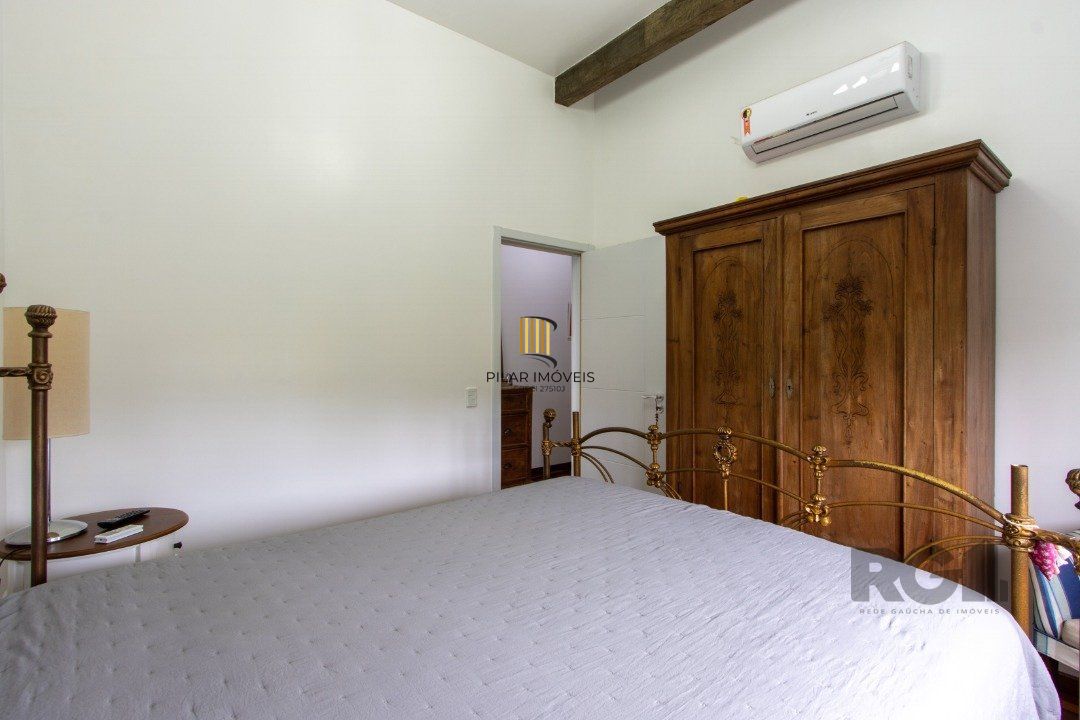 Casa de Condomínio 4 dormitórios no bairro Vila Nova