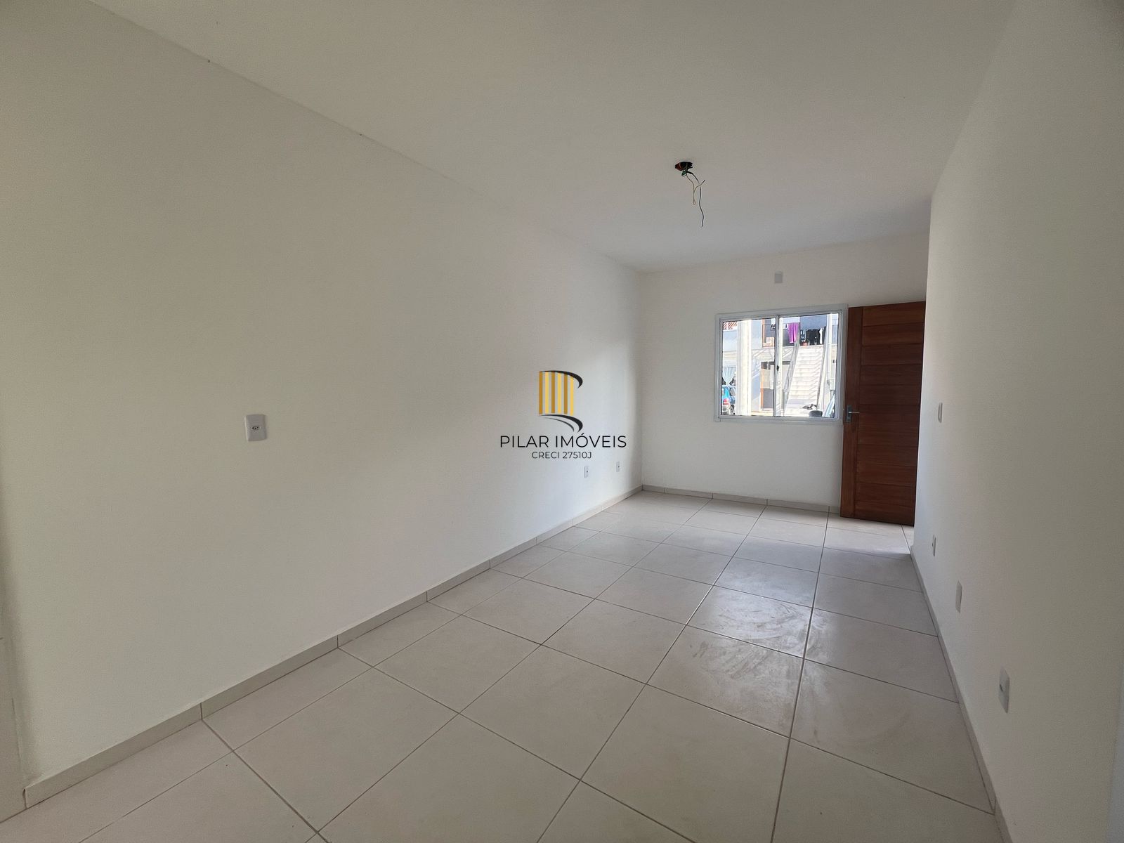 Casa com 2 dormitórios, banheiro social e pátio - Pilar Imóveis
