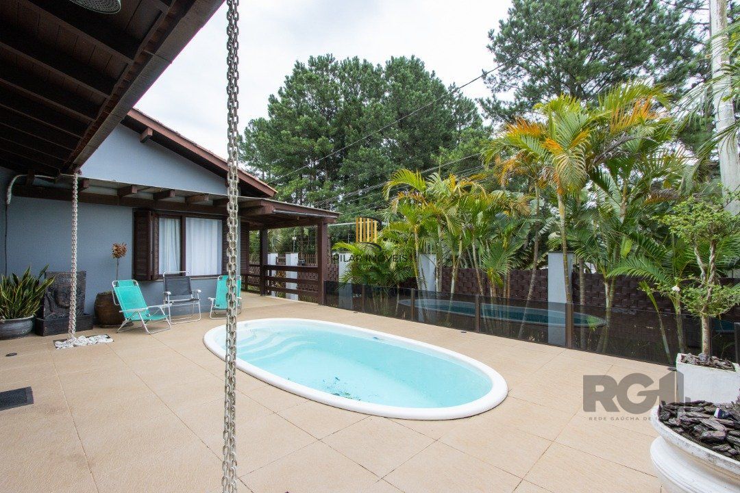Casa 3 dormitórios no bairro Hípica