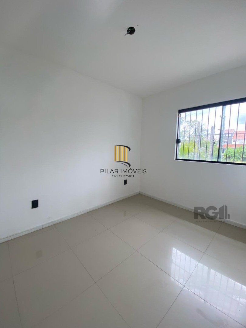 Casa 3 dormitórios no bairro Guarujá