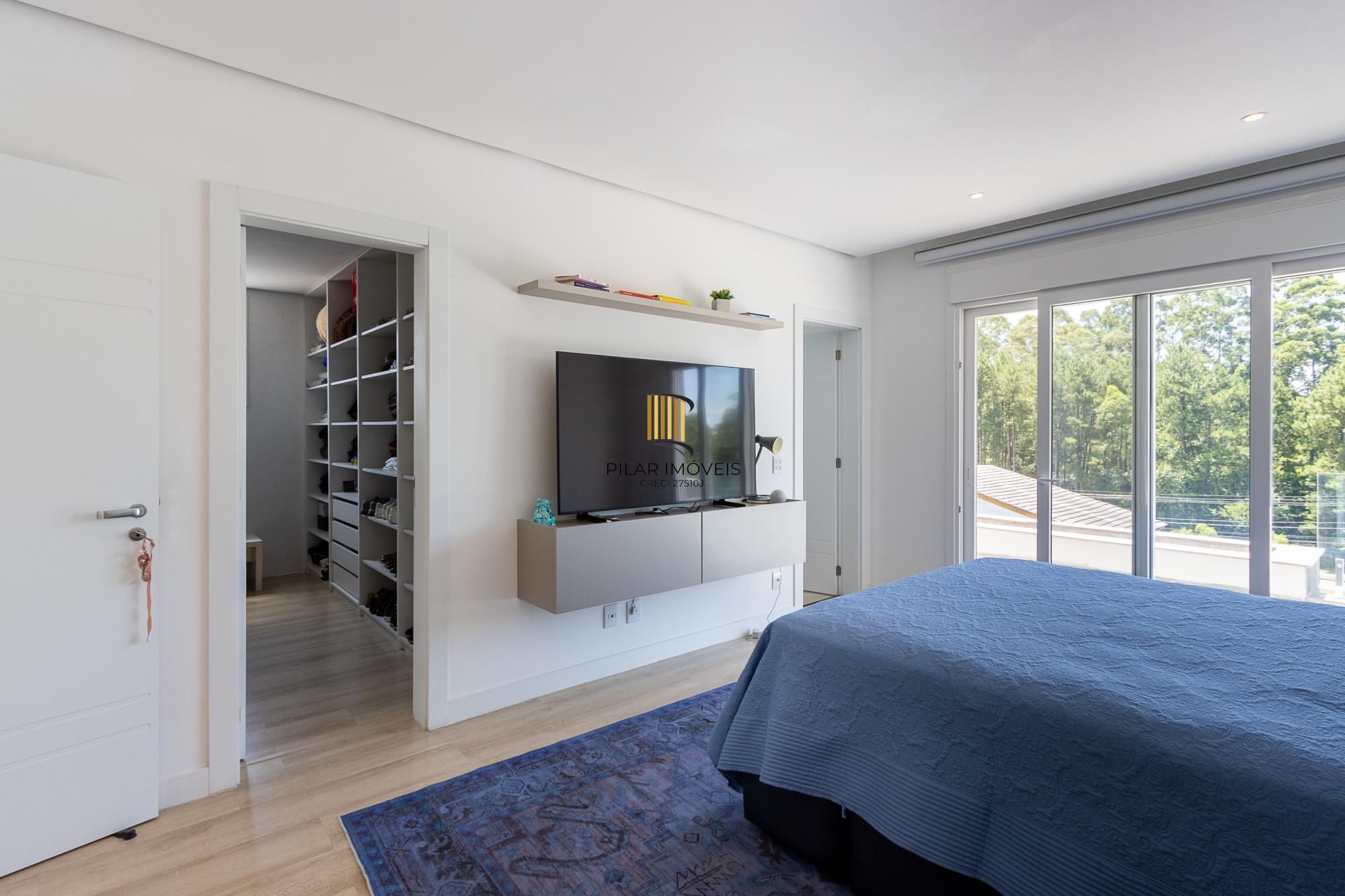 Casa de Condomínio 4 dormitórios no bairro Vila Nova