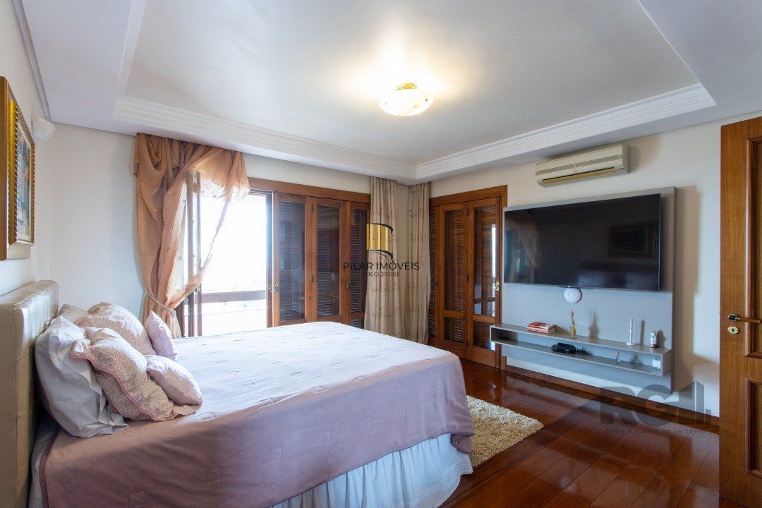 Casa para Venda com 4 dormitórios, sendo 2 suites e 4 vagas no bairro Jardim Isabel