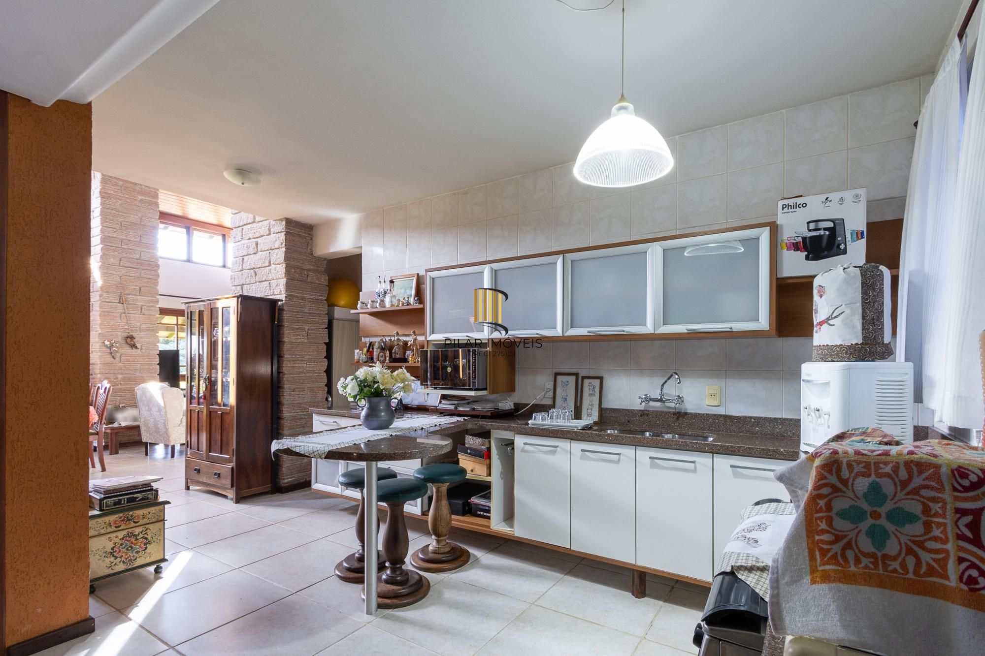 Casa em condomínio á venda com 6 dormitórios em Porto Alegre