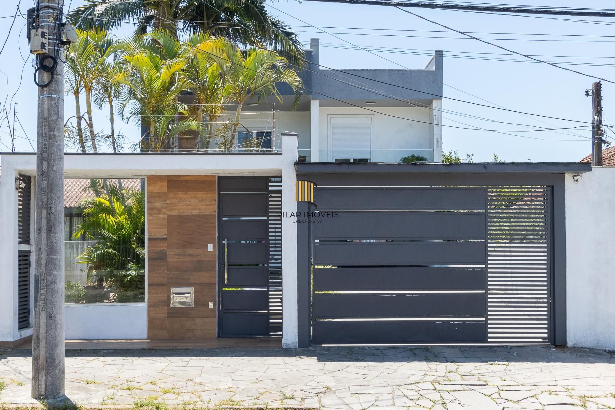Excelente casa de 3 dormitórios, 3 suítes e 2 vagas no bairro Cavalhada. - Pilar Imóveis