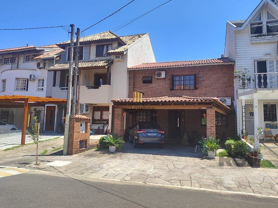 Casa de Condomínio 3 dormitórios no bairro Cavalhada