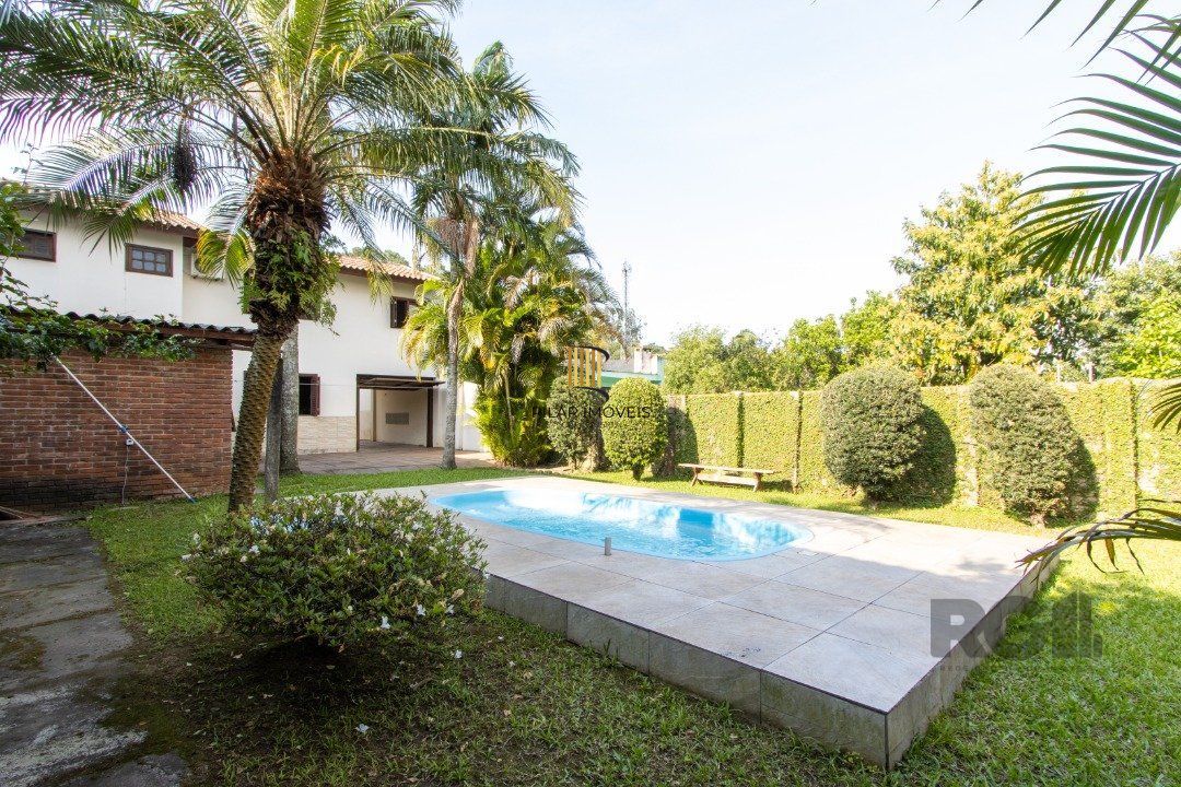 Casa 3 dormitórios no bairro Camaquã
