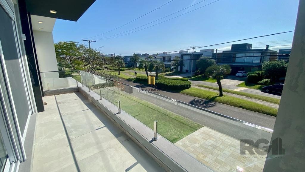Casa de Condomínio 5 dormitórios no bairro Atlântida Sul