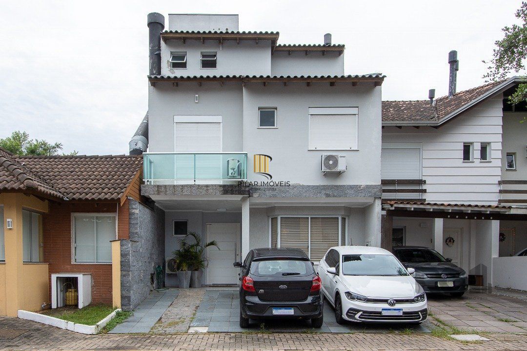 Casa de Condomínio 4 dormitórios no bairro Vila Nova - Pilar Imóveis