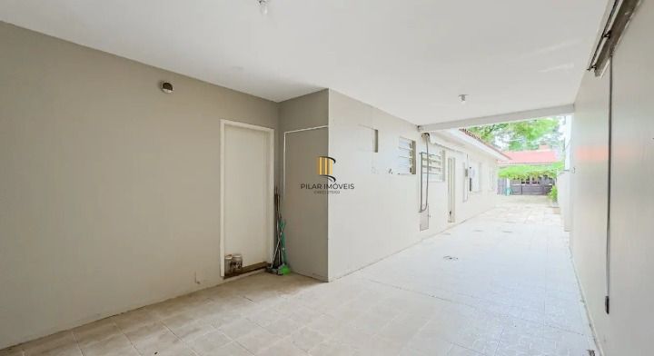 Casa de 3 dormitórios, 1 suíte e 3 vagas de garagem, bairro Ipanema.