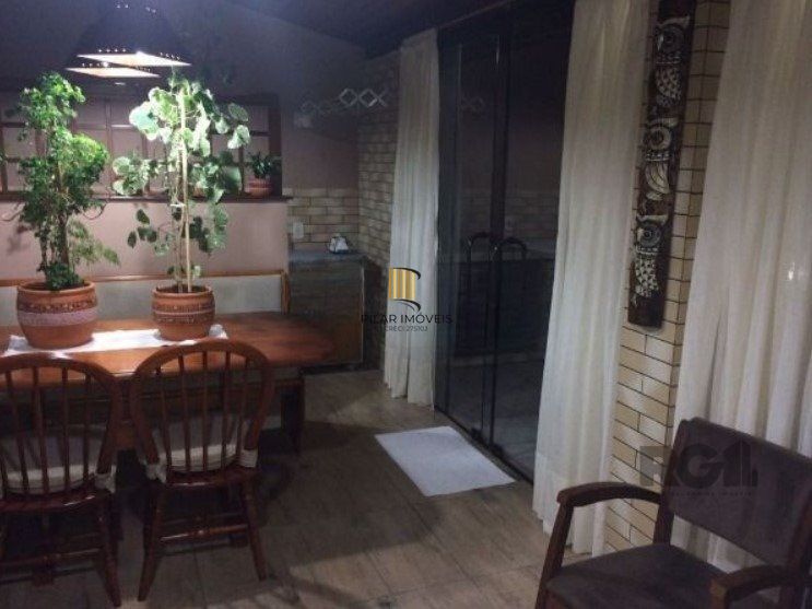 Casa de Condomínio 3 dormitórios no bairro Cavalhada