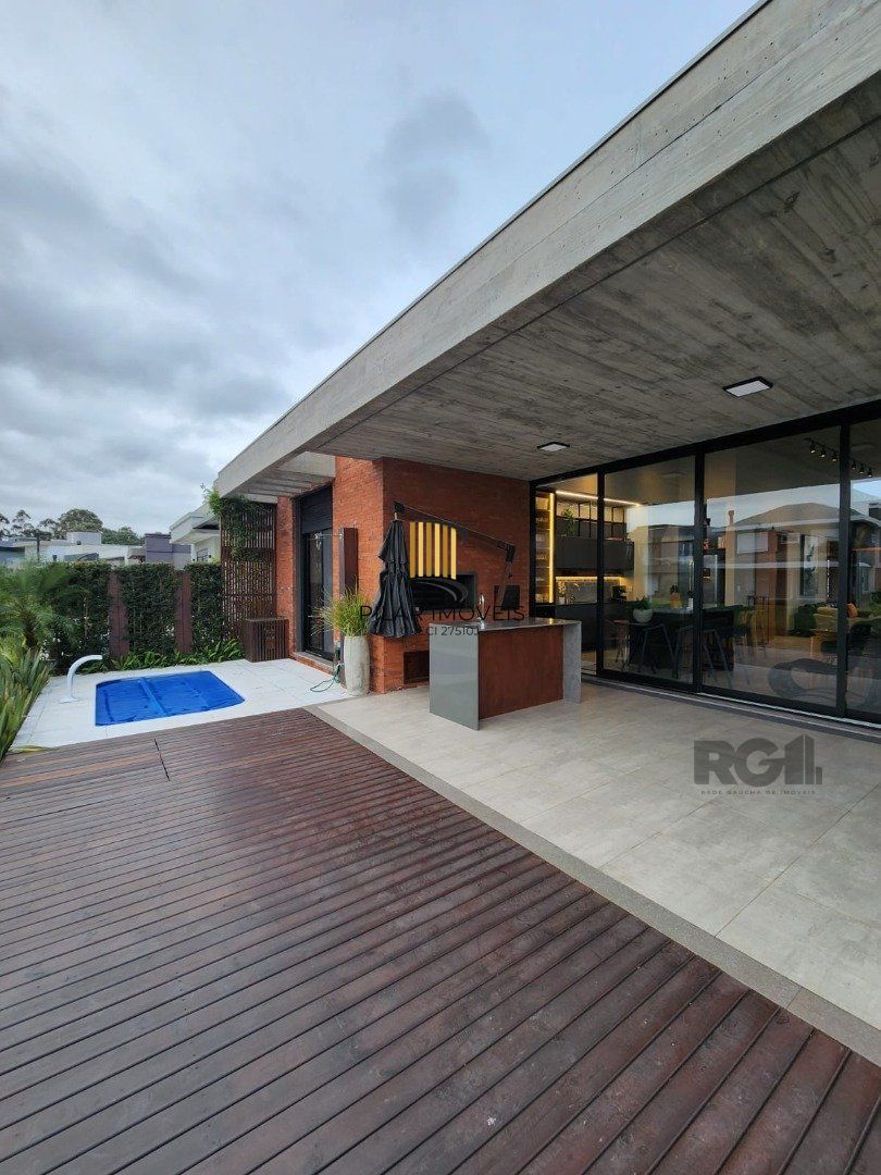 Casa de Condomínio 4 dormitórios no bairro Capão Ilhas Resort