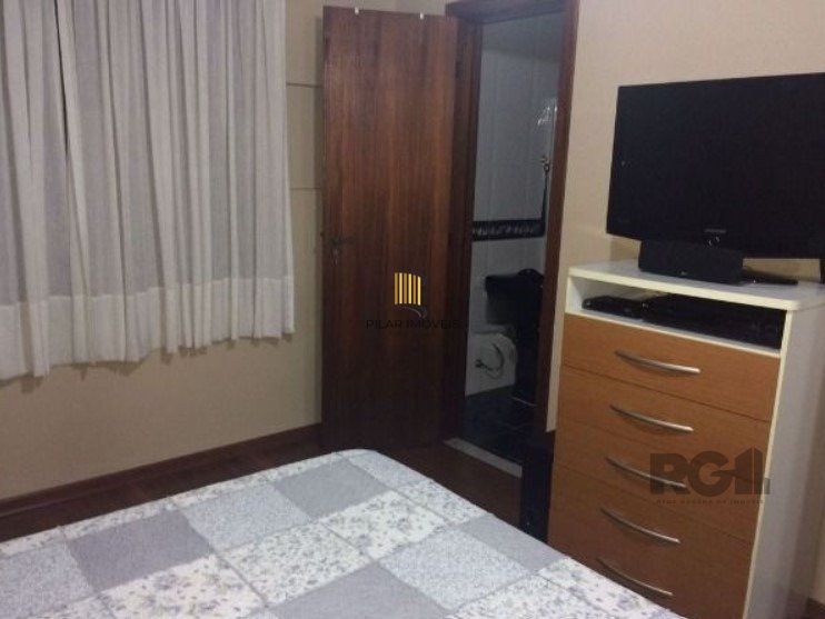 Casa de Condomínio 3 dormitórios no bairro Cavalhada