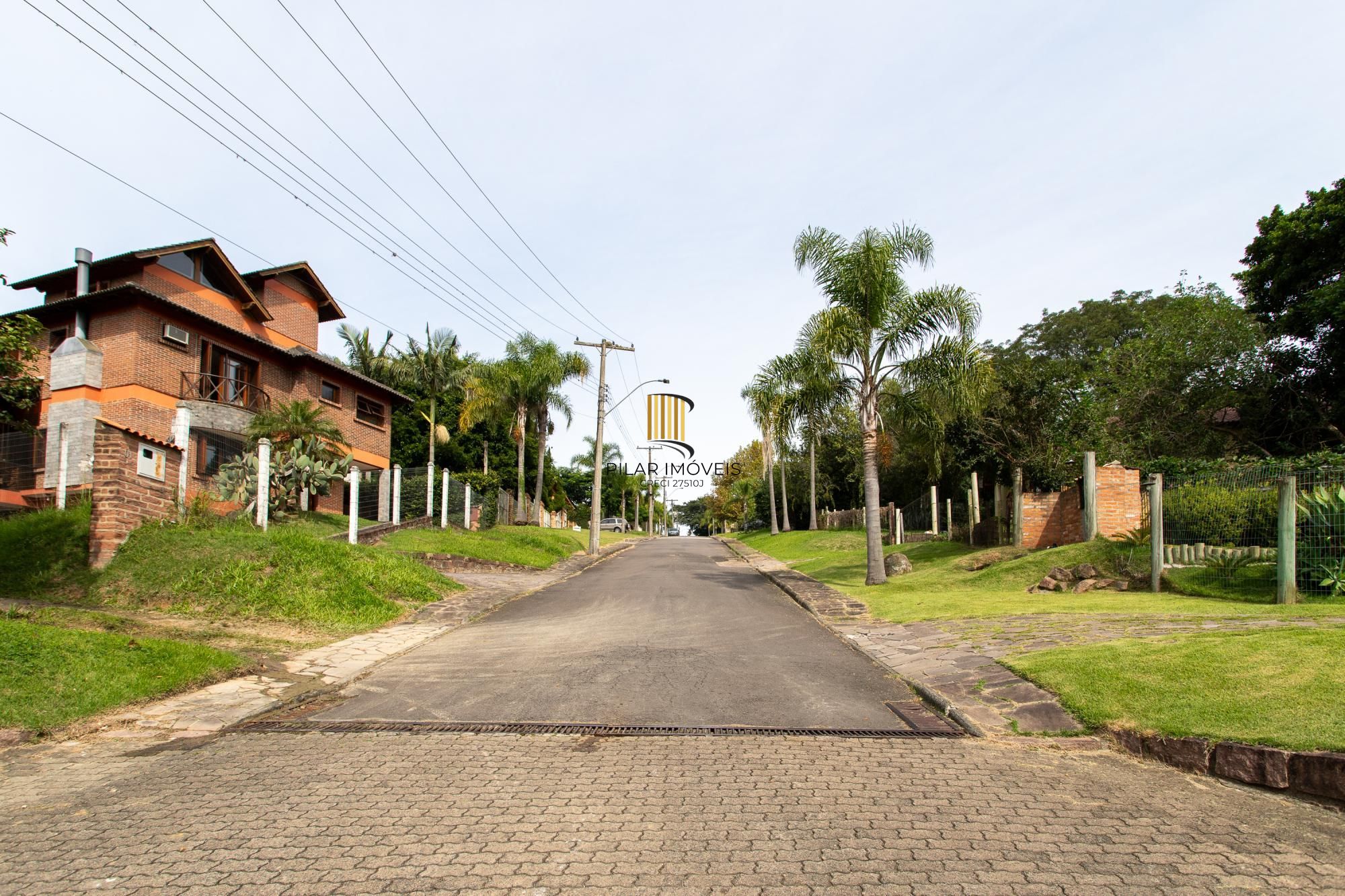 Casa em condomínio á venda com 6 dormitórios em Porto Alegre