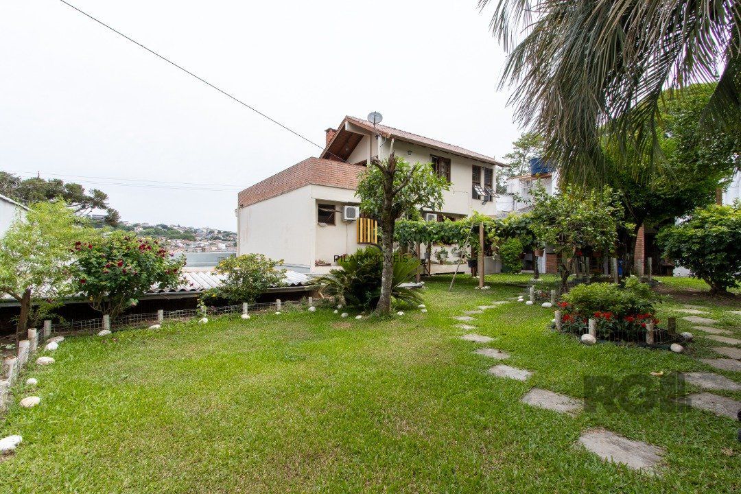 Casa para Venda - 440m², 3 dormitórios, sendo 1 suites, 2 vagas - Santa Tereza