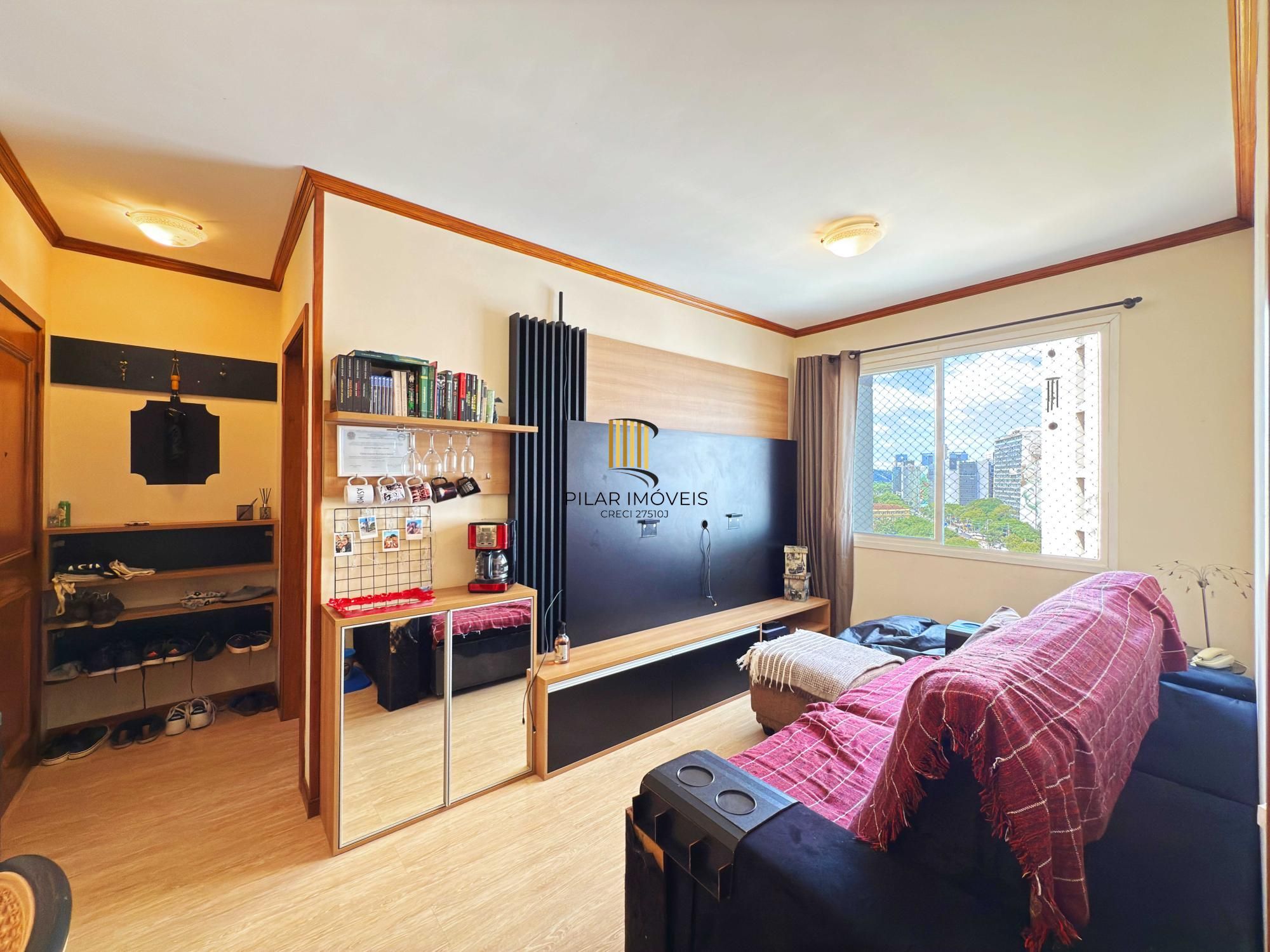 Apartamento de 2 dormitórios e 1 vaga de garagem no Centro Histórico.