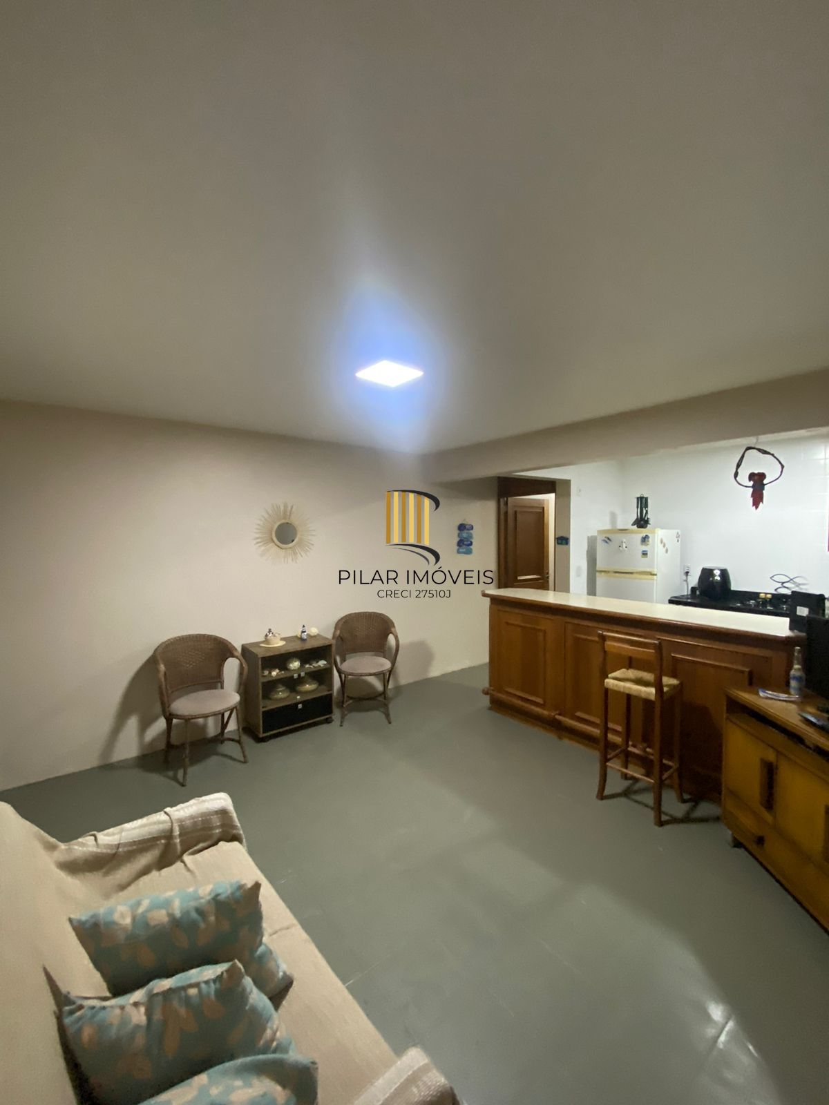 Apartamento com 2 dormitórios e garagem em Torres