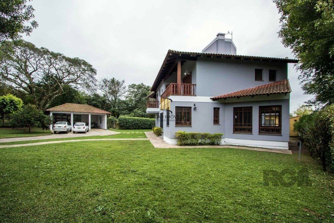 Sobrado com 6 suites, lareira, lavabo, pátio - Bairro Belém Velho