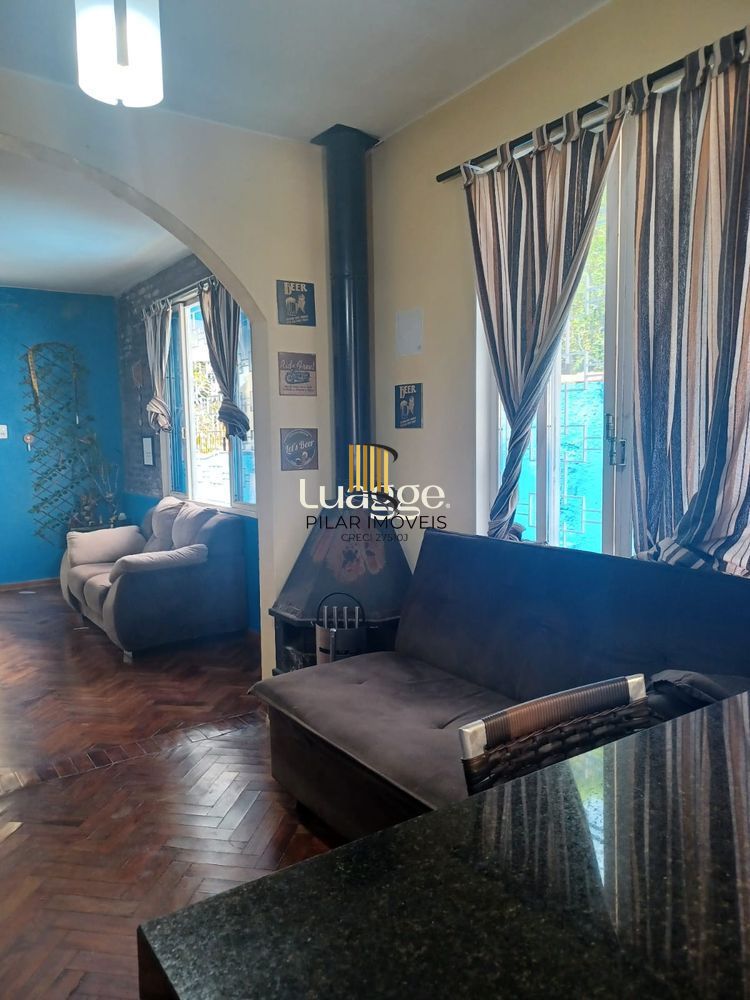 Casa 3 dormitórios no bairro Camaquã