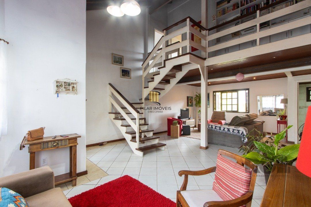 Casa 3 dormitórios no bairro Camaquã