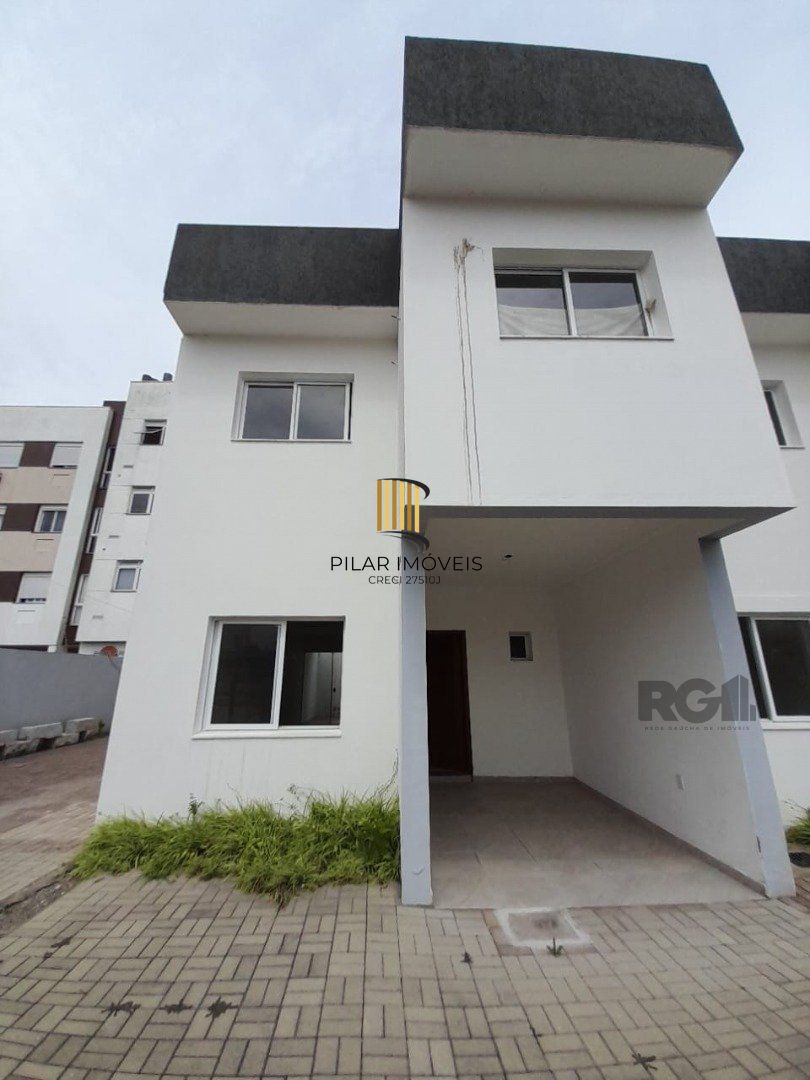 Casa 3 dormitórios no bairro Camaquã - Pilar Imóveis