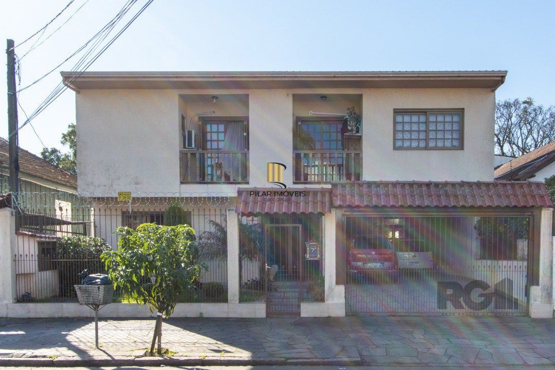 Casa de alvenaria, 3 quartos, 1 suíte, 4 banheiros e 5 vagas de garagem. - Pilar Imóveis