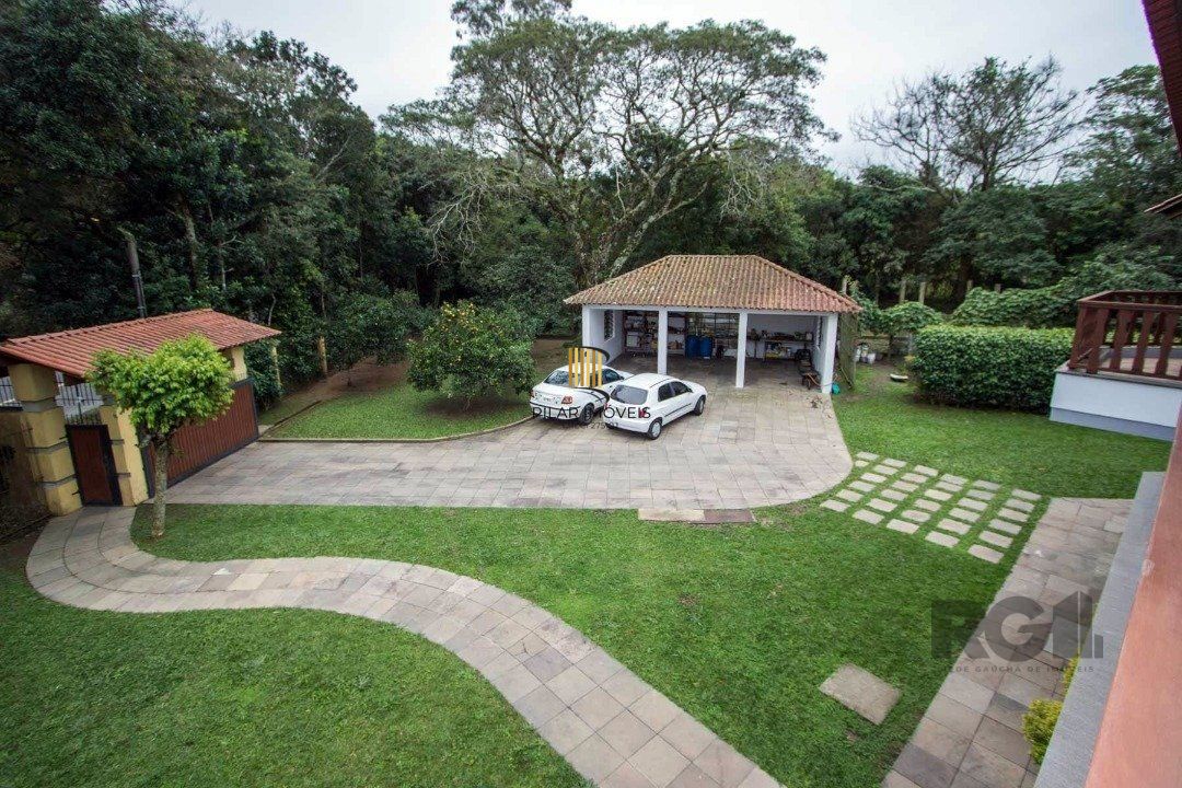 Sobrado com 6 suites, lareira, lavabo, pátio - Bairro Belém Velho