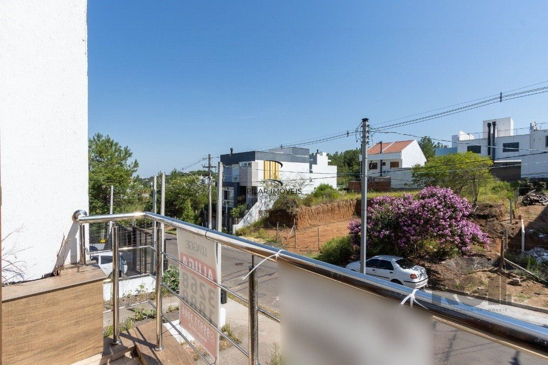 Casa 3 dormitórios no bairro Guarujá