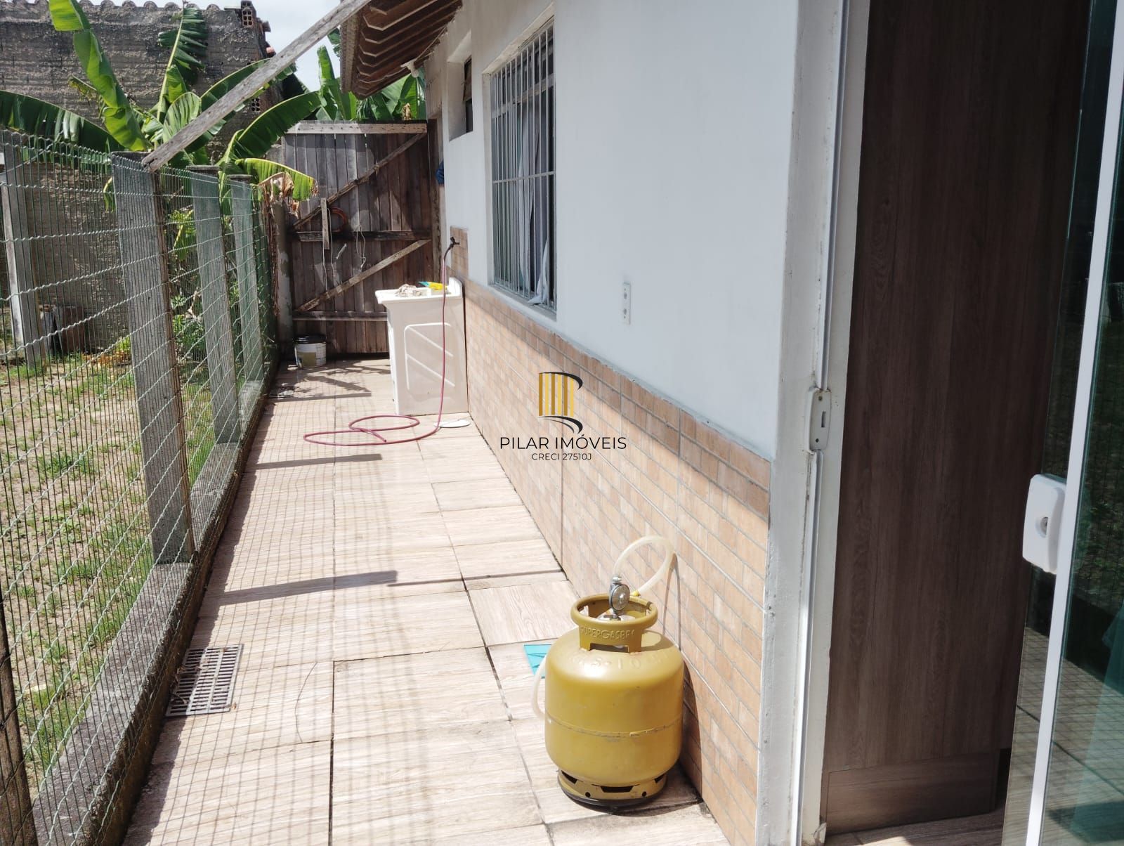 Casa 3 dormitórios no bairro Posto 4 (Capão Novo)