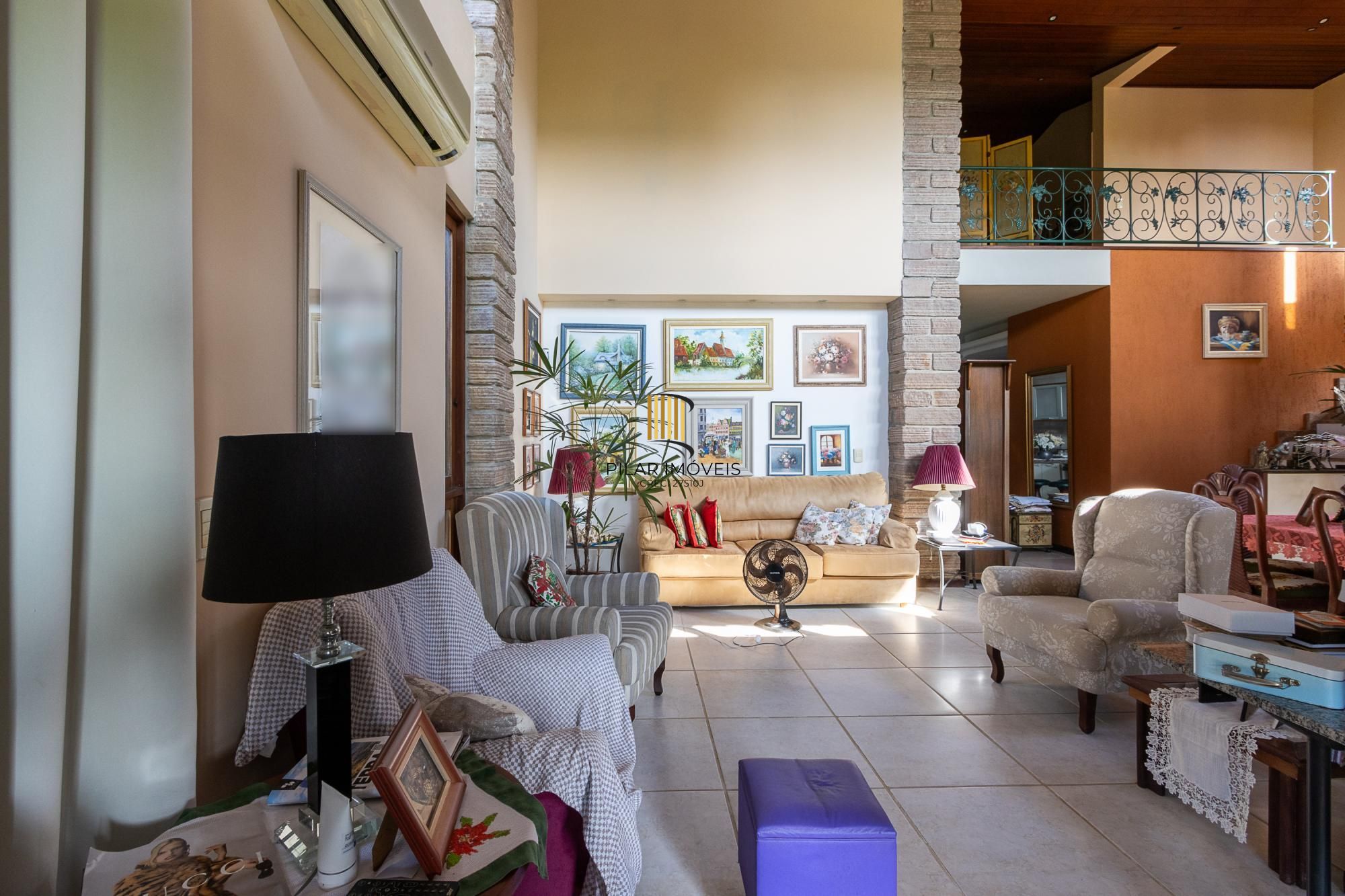 Casa em condomínio á venda com 6 dormitórios em Porto Alegre