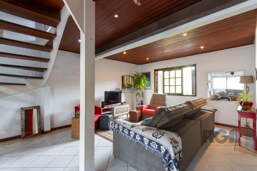 Casa 3 dormitórios no bairro Camaquã