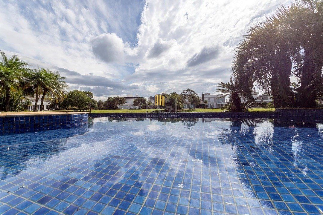 Casa Condominio para Venda - 399m², 5 dormitórios, sendo 5 suites, 4 vagas - Atlântida