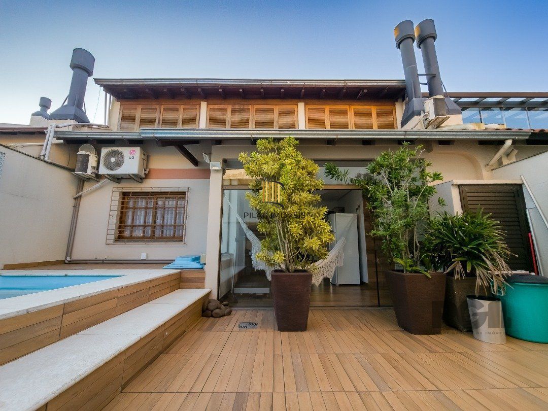 Casa de Condomínio 3 dormitórios no bairro Cavalhada