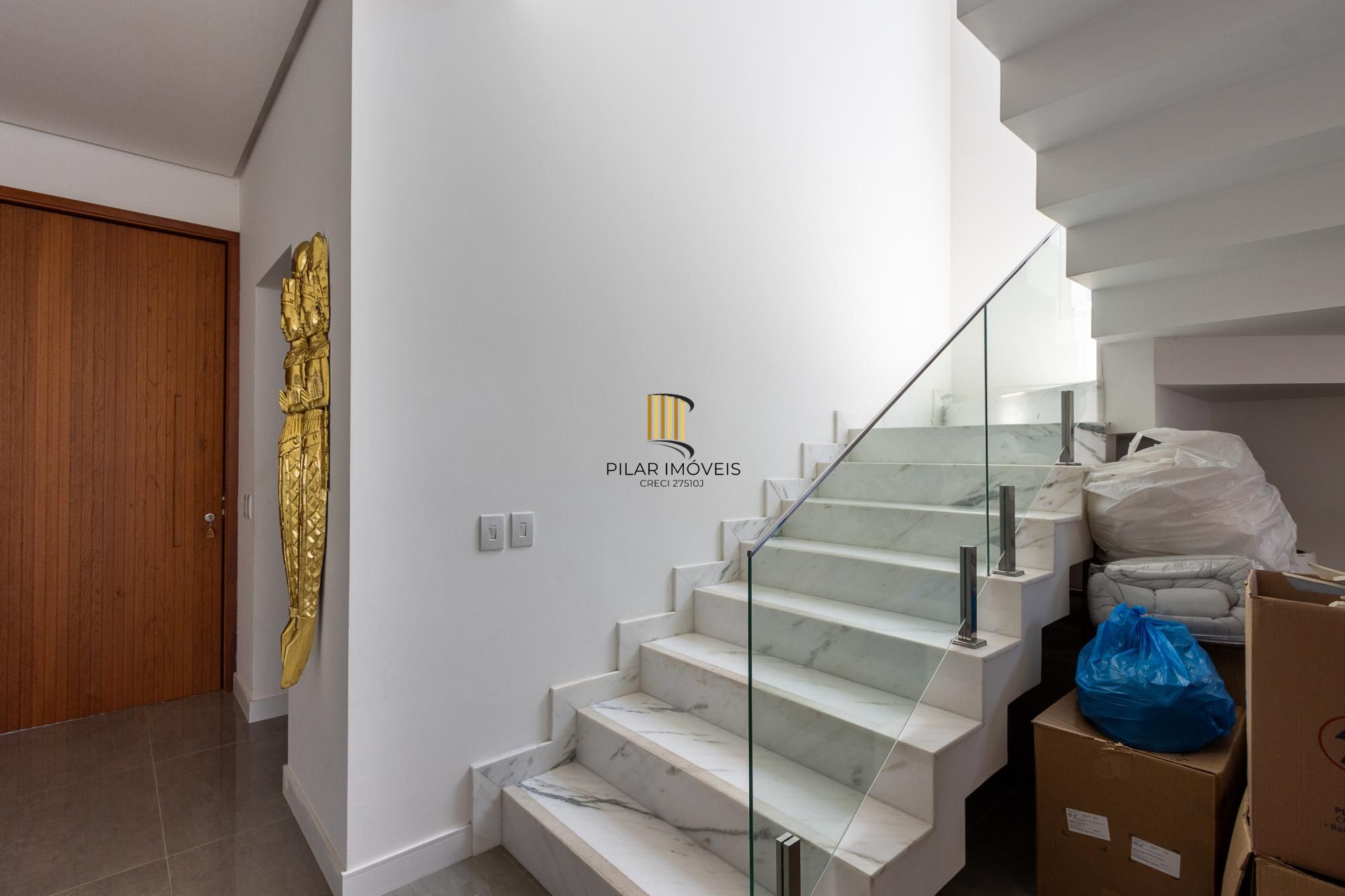 Casa de Condomínio 4 dormitórios no bairro Vila Nova