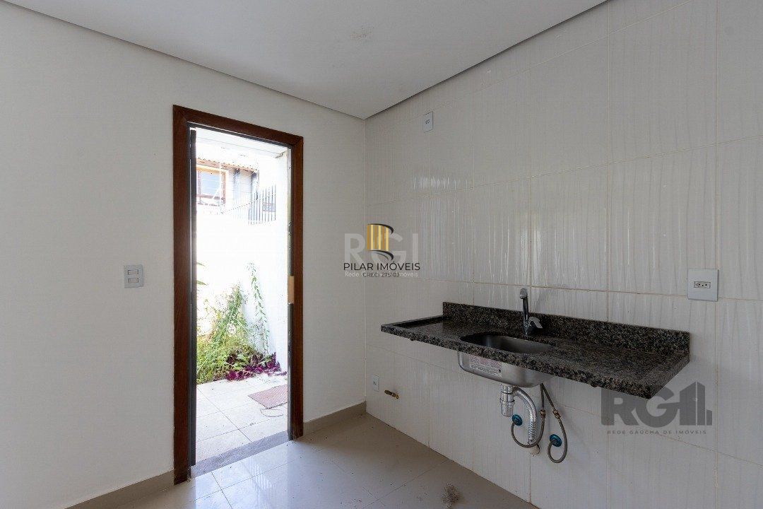 Casa 3 dormitórios no bairro Guarujá