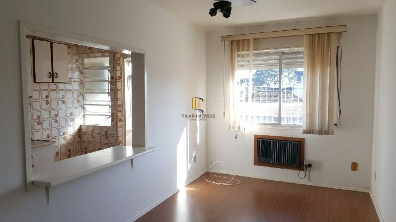 Apartamento de 1 dormitório e 1 vaga escriturada no bairro Camaquã. - Pilar Imóveis